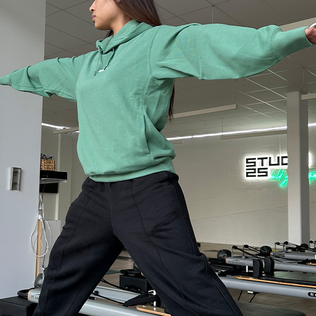 pilates-hiit-personal-training-green-hoodie-s25-baby-pink-logo-inside
